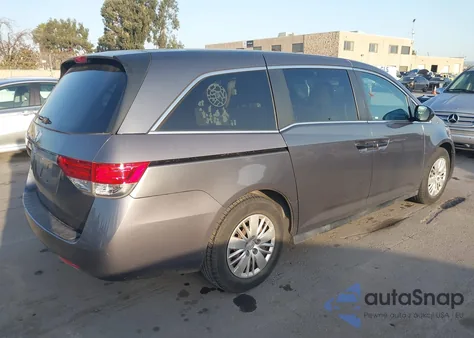2014 Honda Odyssey Lx z USA, uszkodzony, nr VIN 5FNRL5H21EB123767